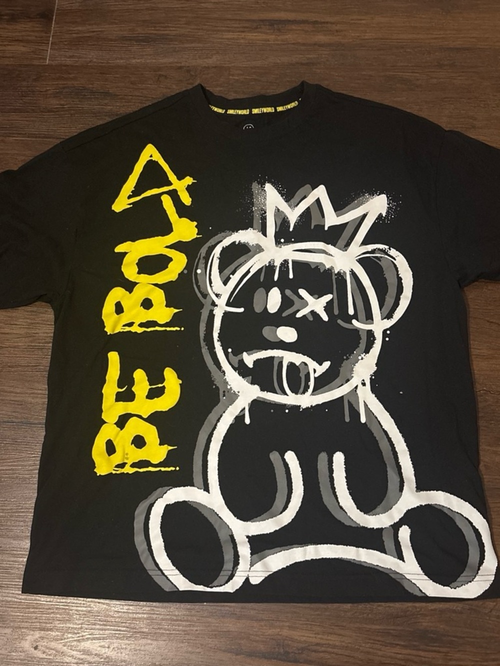 Black Graphic Tee with Yellow "BE BOLD" Text